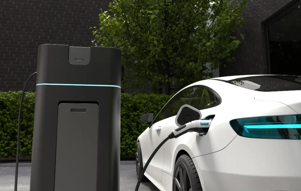Electric vehicle charging at a charging station