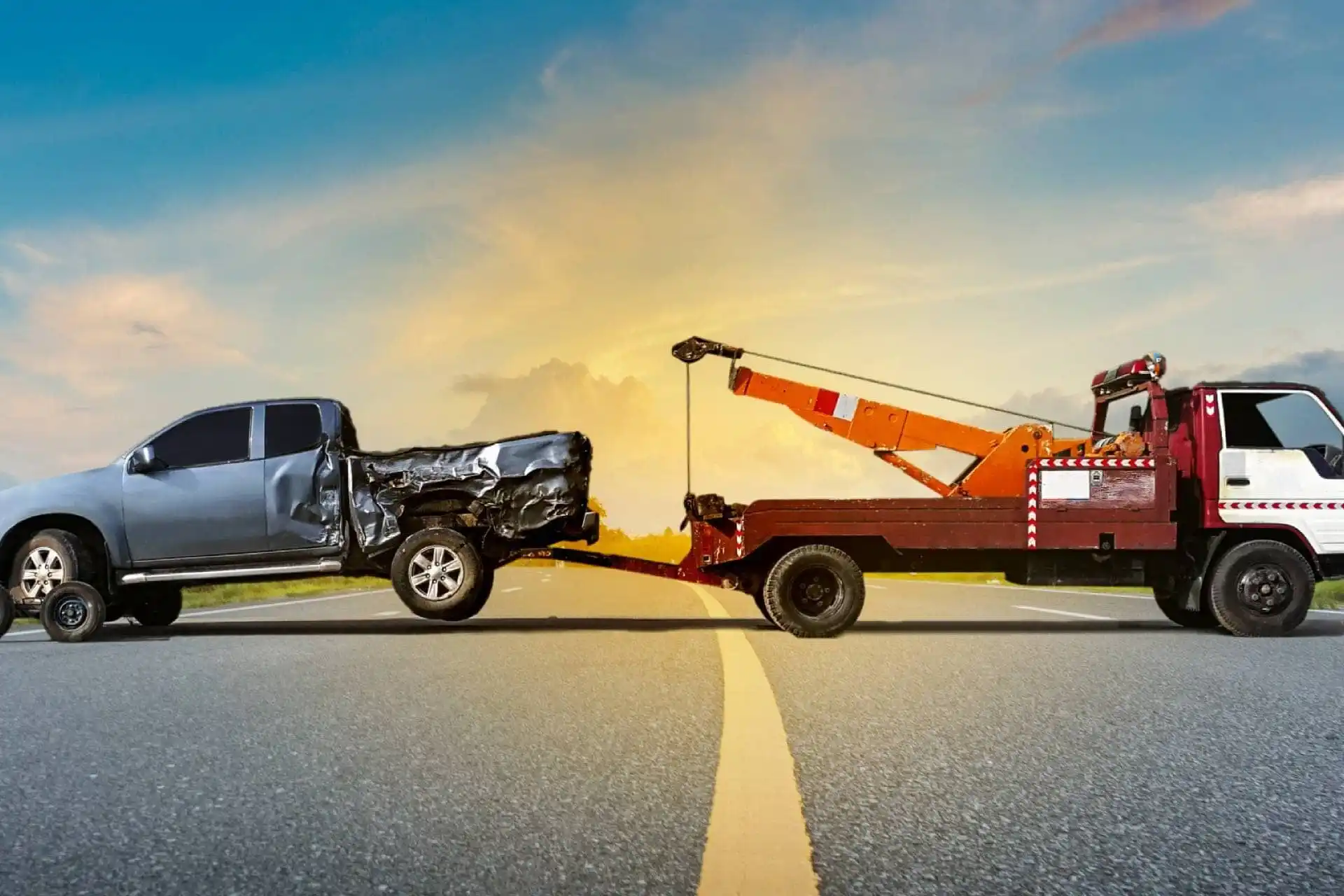 An electric vehicle loaded onto a flatbed tow truck with all four wheels off the ground, the towing method recommended for EVs in Melbourne.
